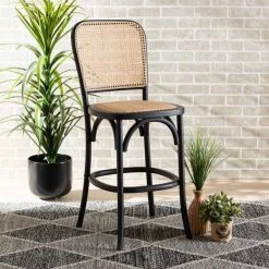 Baxton Studio Vance Mid-Century Brown Woven Rattan and Black Wood Cane Counter Stool